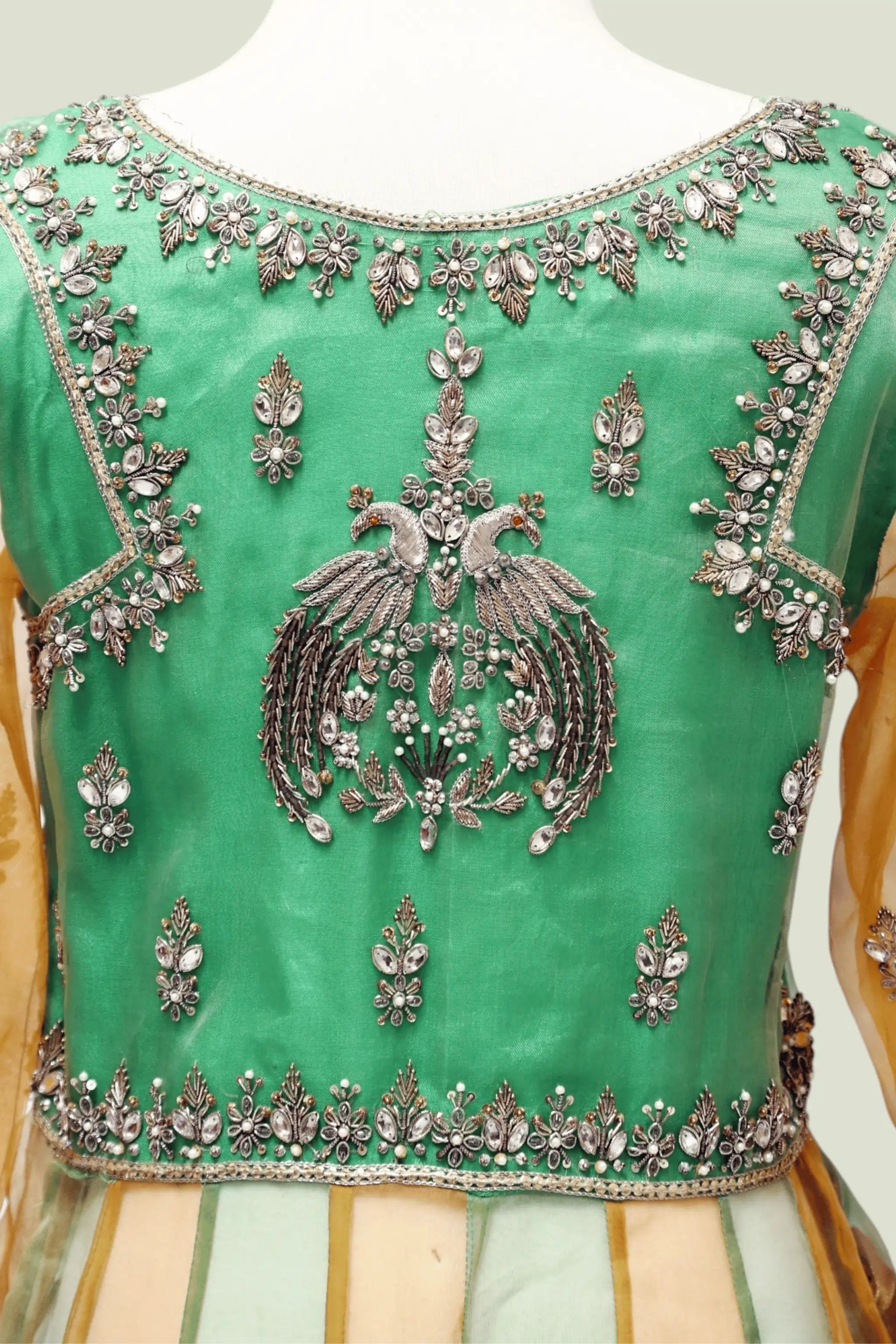 Back View Shamrock three-piece green and gold organza wedding dress with embellished beads and stars work, featuring straight kurta, lehnga, and dupatta — festive bridal wear.