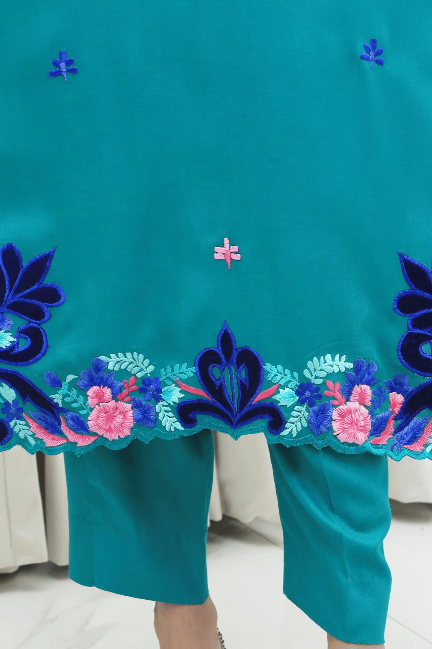 Back view of Blue Sky 3 piece embroidered suit in marina fabric
