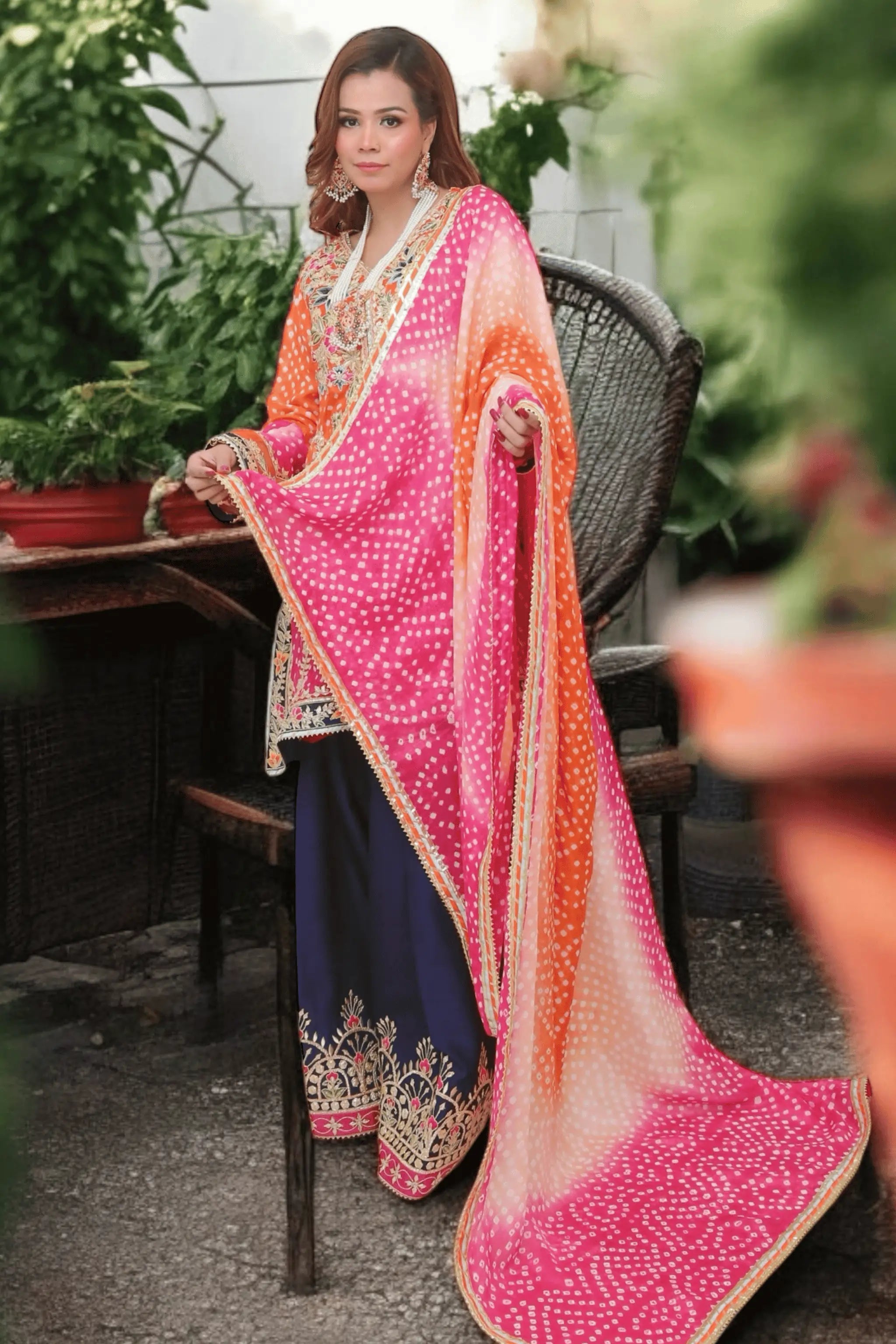 “Chunri dupatta with four-side lace border and gota detailing.”