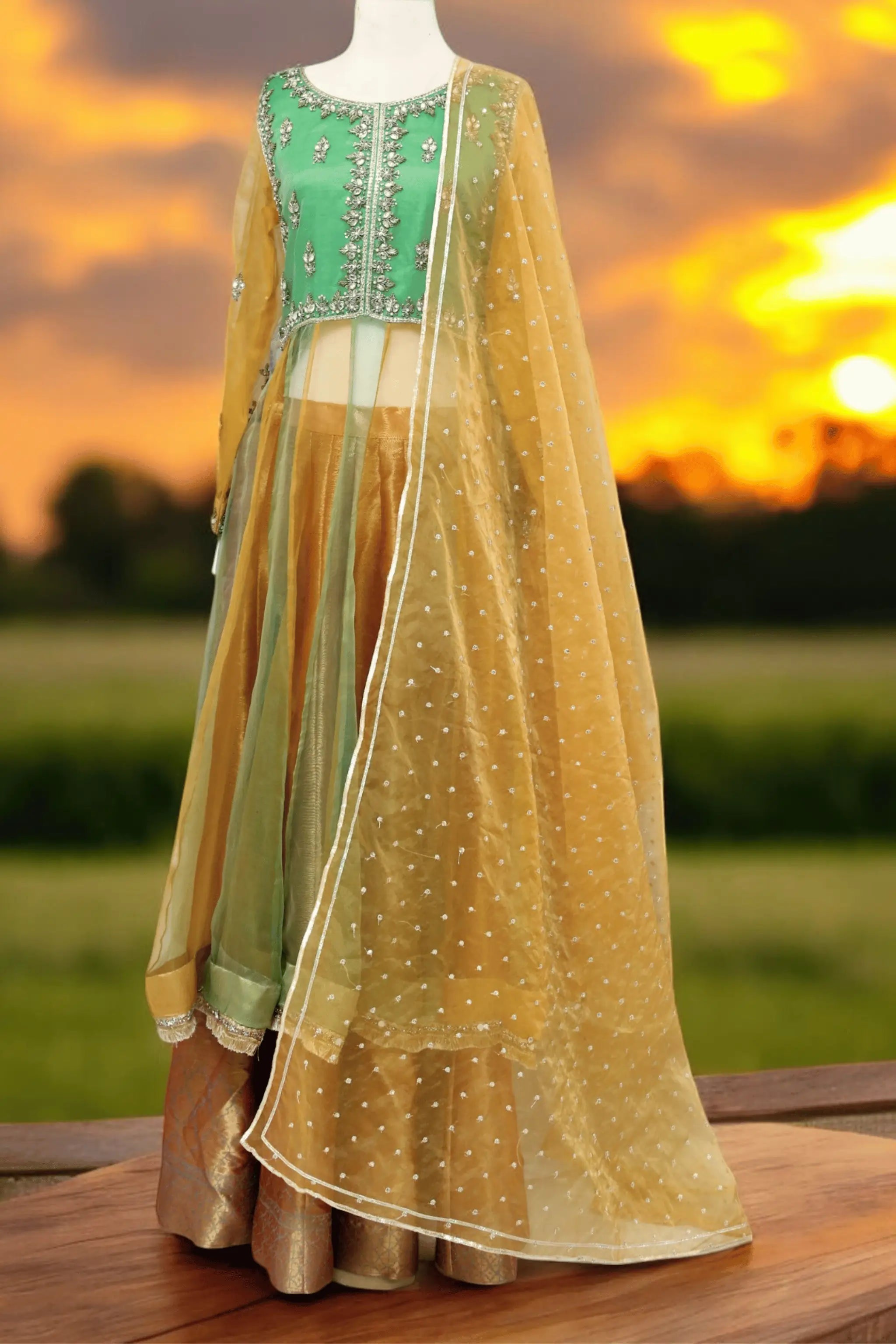 Shamrock three-piece green and gold organza wedding dress with embellished beads and stars work, featuring straight kurta, lehnga, and dupatta — festive wear.