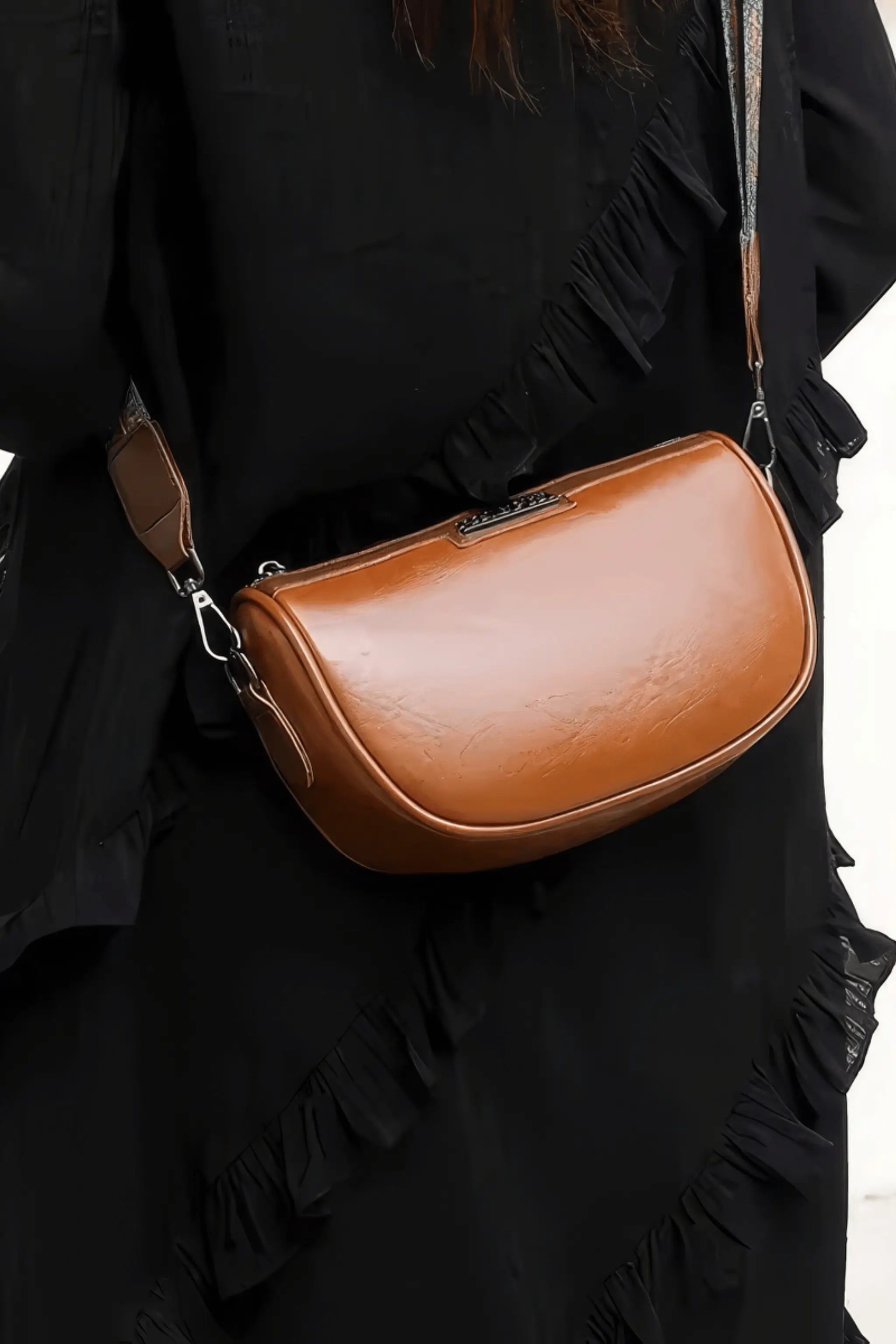 Patterned strap detail on brown crescent PU leather shoulder bag, women’s fashion crossbody