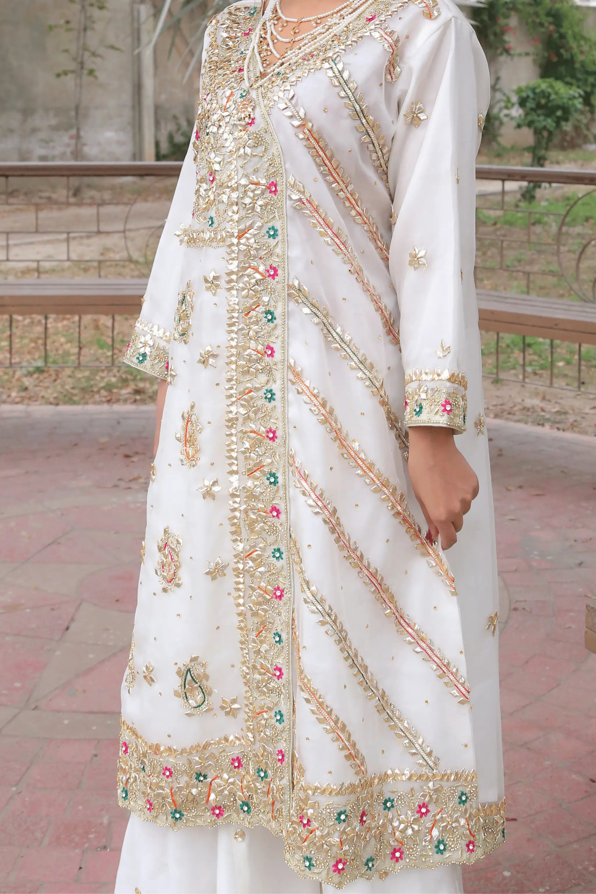 Silk sharara paired with Zareen organza shirt & dupatta