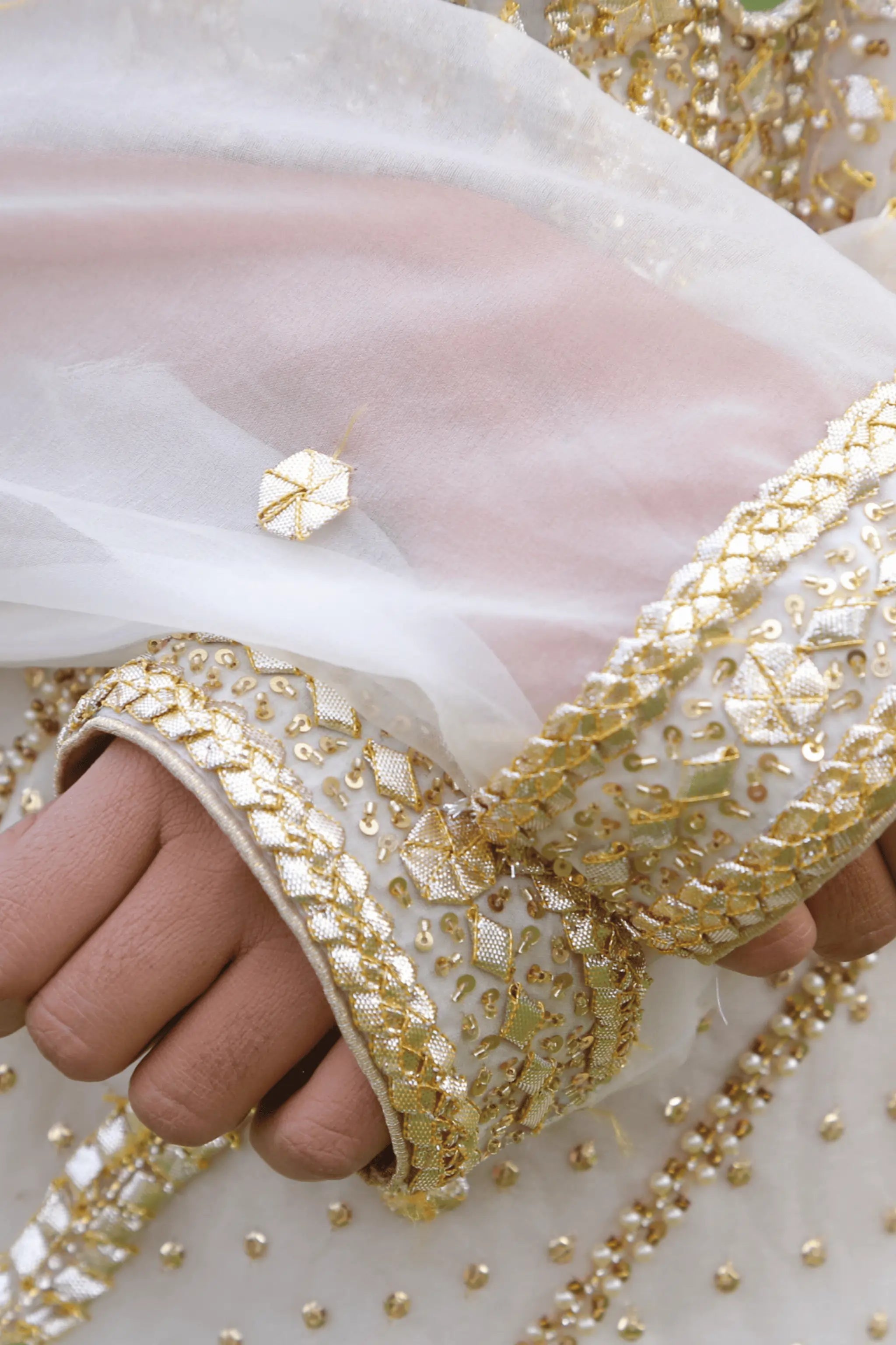 Silk sharara paired with organza embroidered shirt