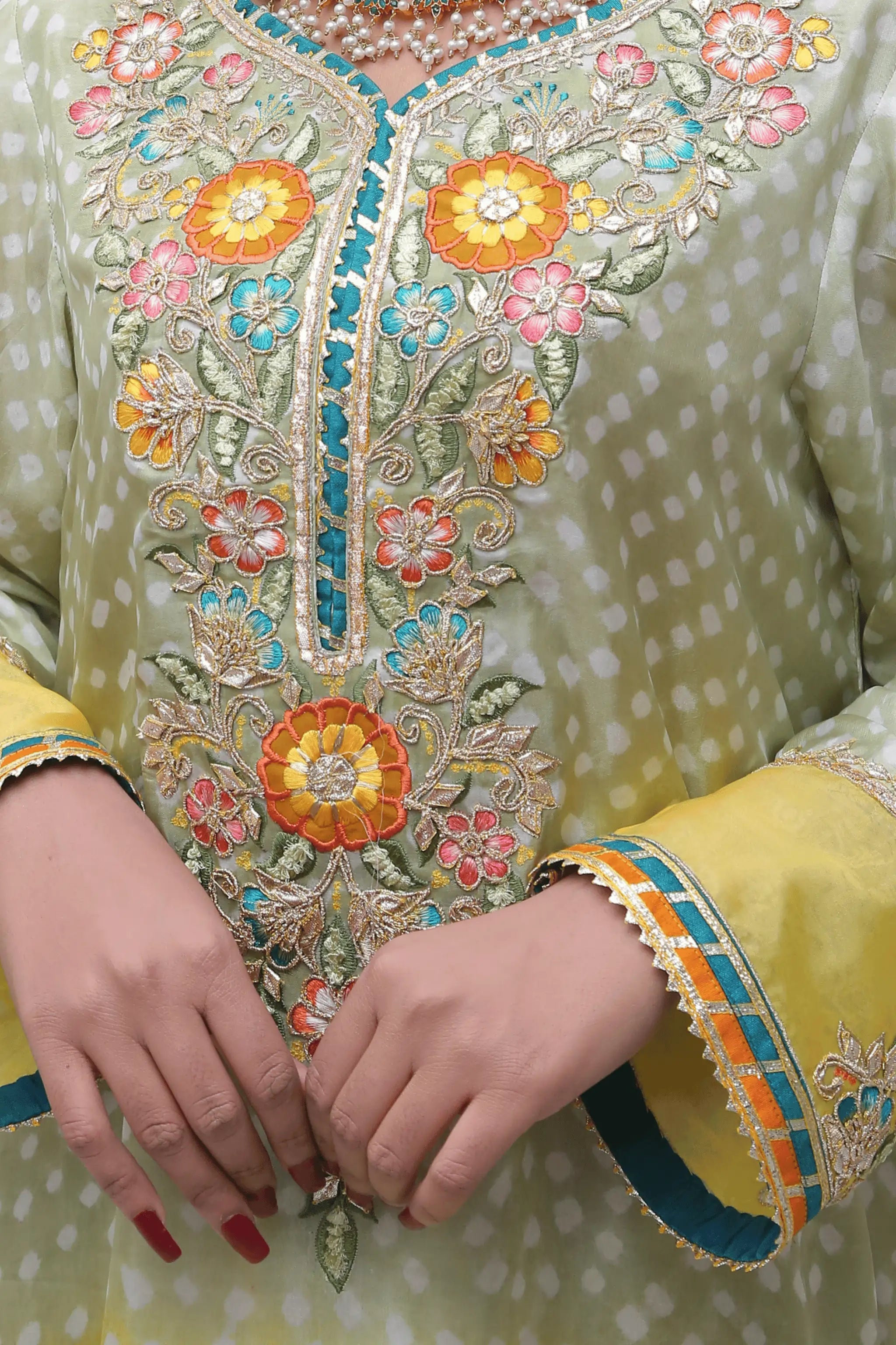 "Traditional green and yellow chunri frock with embroidery"