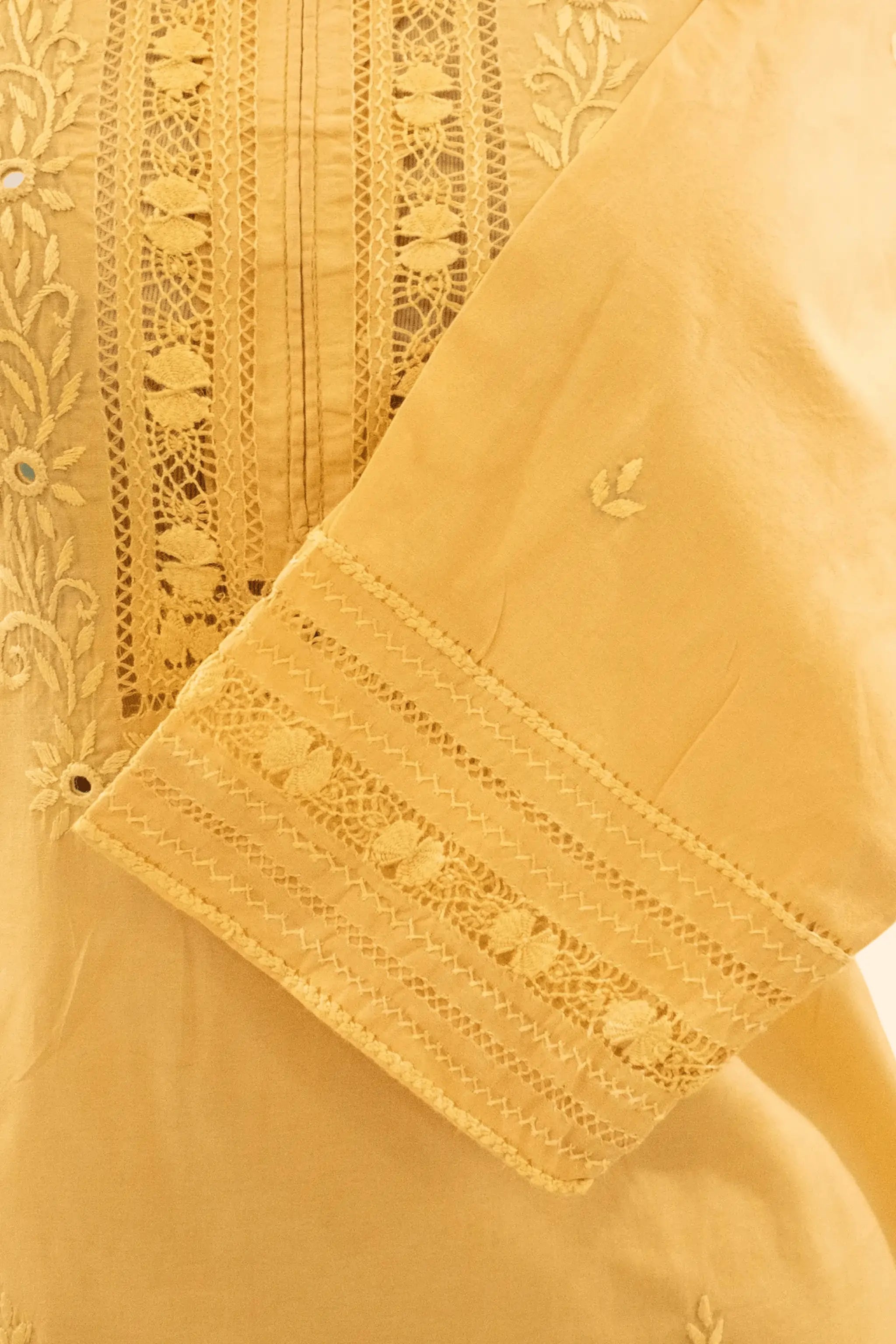 Amber unstitched shirt with embroidered chest and border