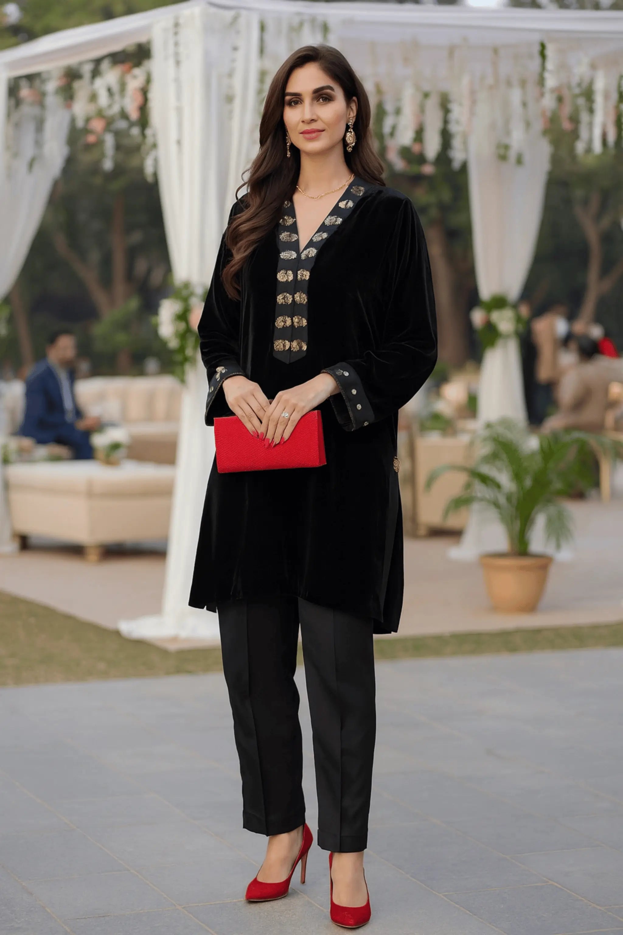 Black Opulence – 2-piece black velvet semi-formal dress with sequin embellished neckline and sleeves, paired with straight trousers