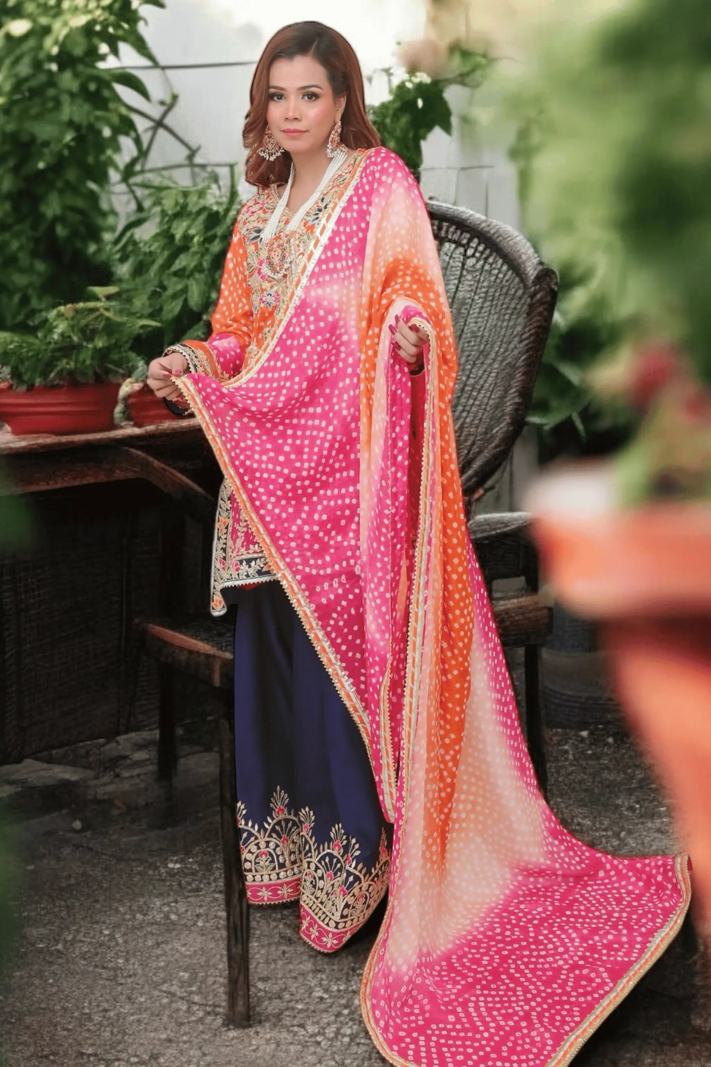 “Chunri dupatta with four-side lace border and gota detailing.”