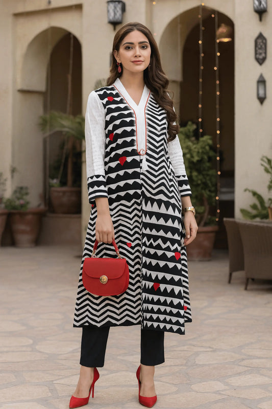 Close-up of Aztec black and white premium lawn shirt with ralli embroidery.