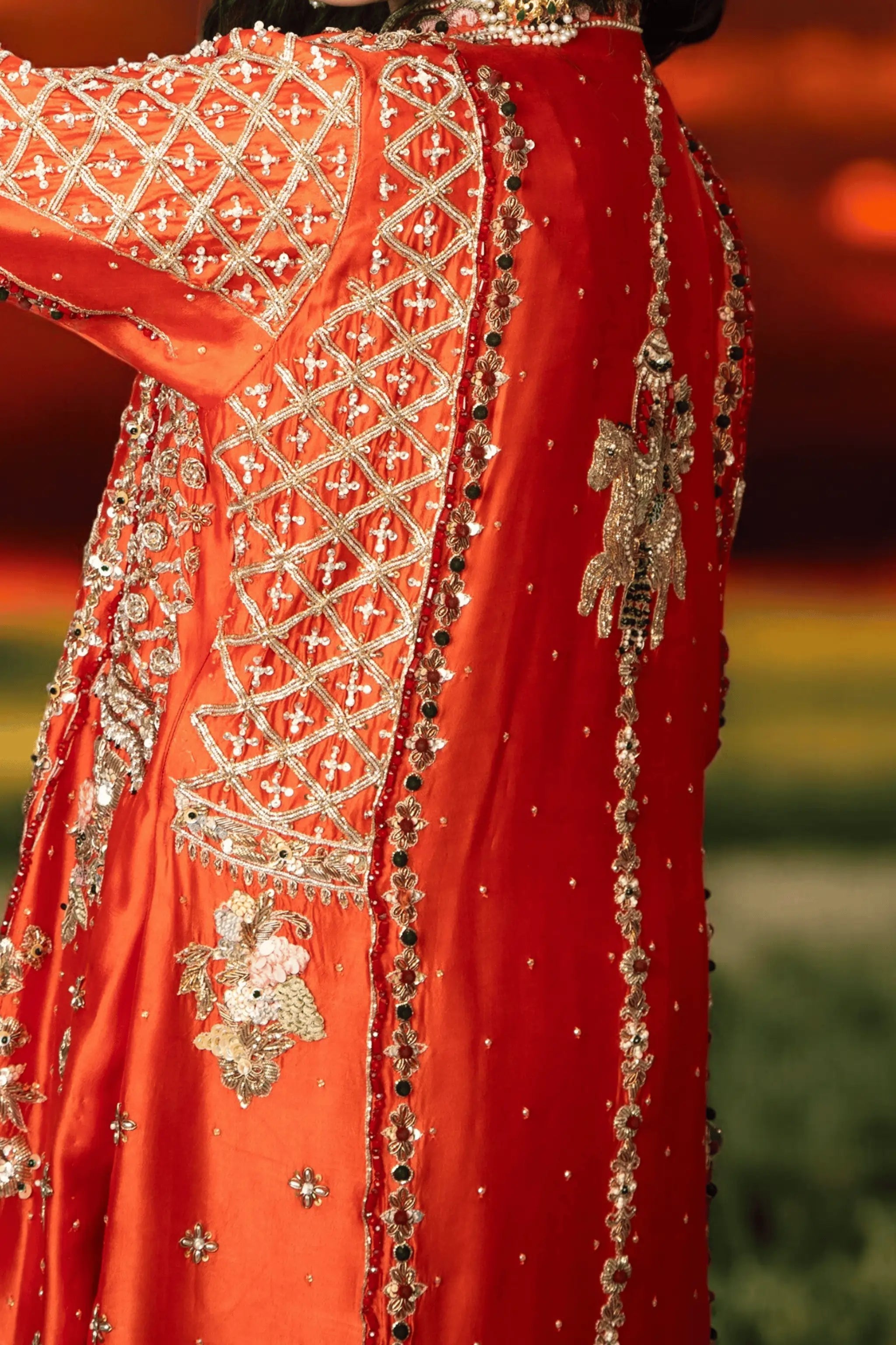 Close-up of Cinnamon dress embroidery with sequins and zardozi work