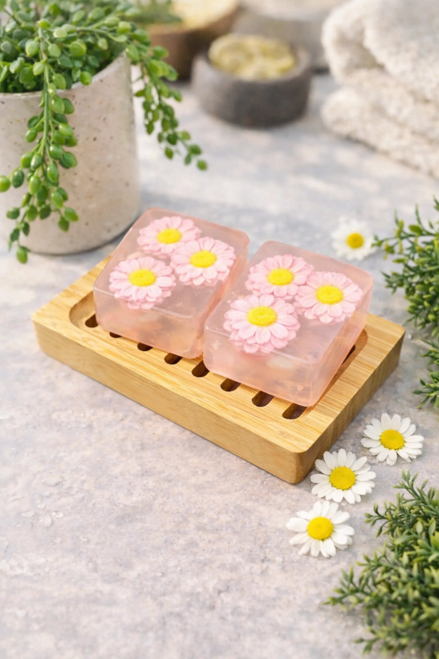 “Close-up of Daisy Glutathione Soap showing handmade design and natural soap texture”
