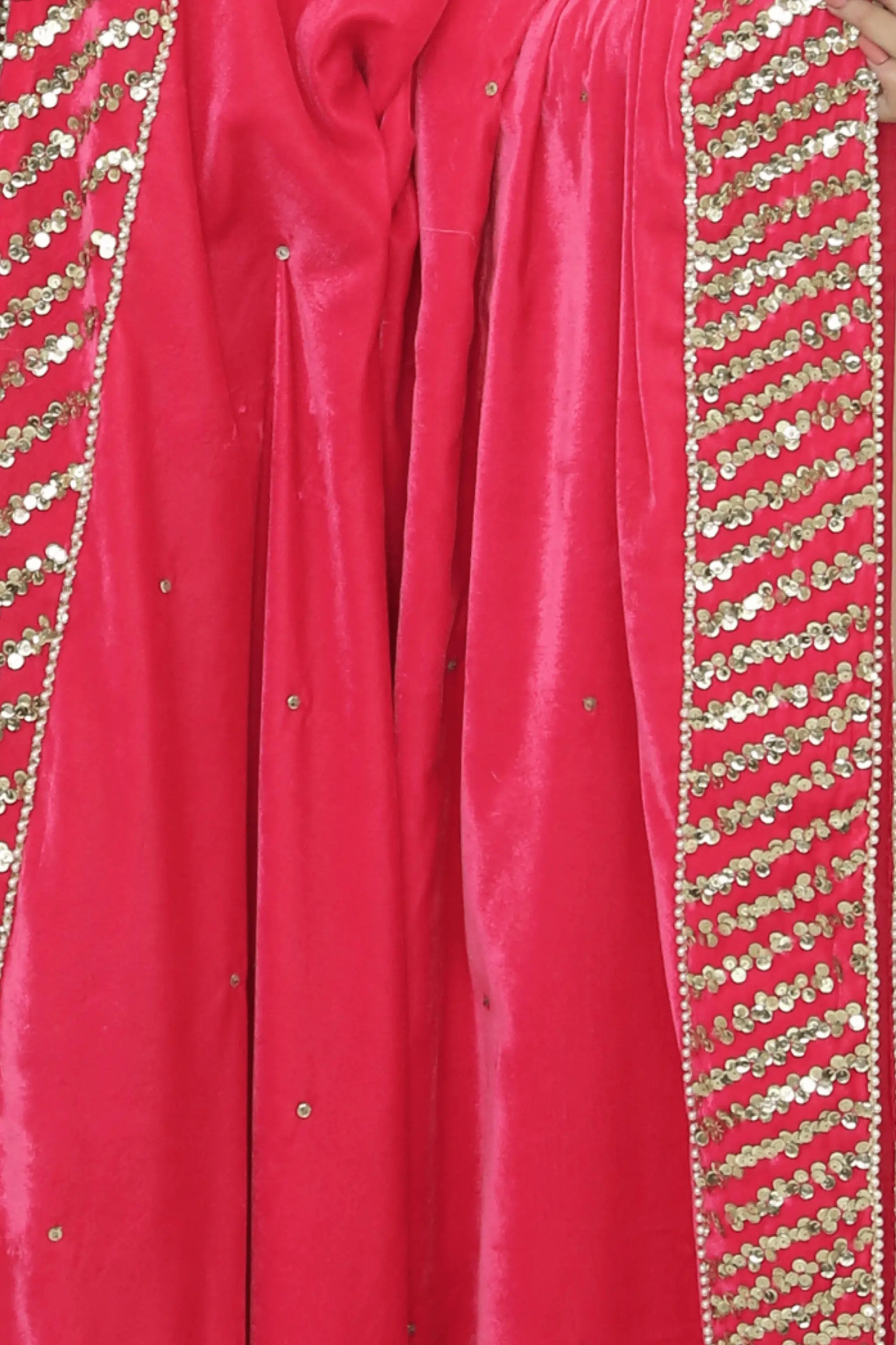 Close-up of detailed sequin and pearl embroidery on velvet dopatta.