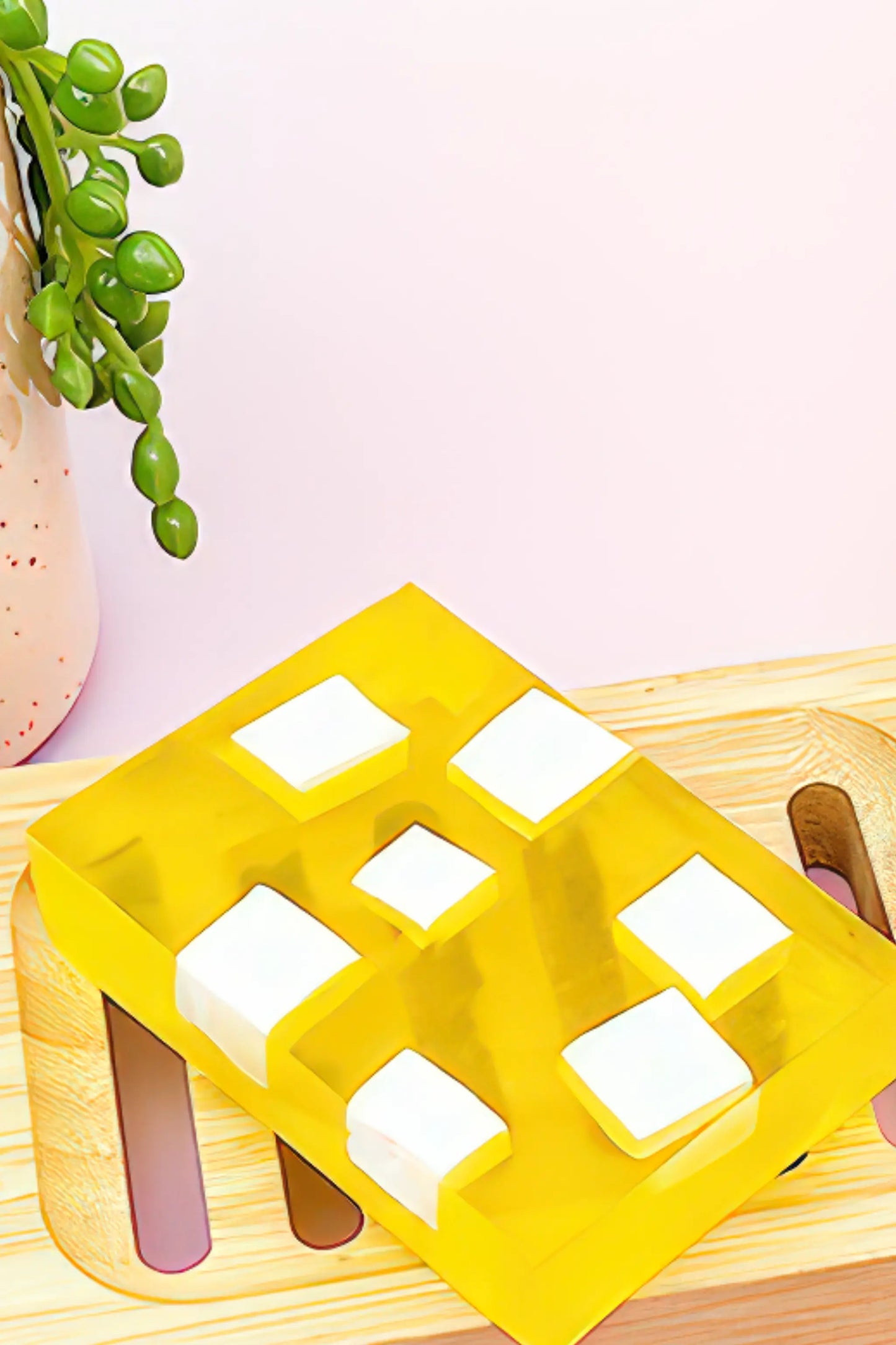 “Close-up of yellow transparent Glutathione with Papaya Extract Soap showing handmade texture”