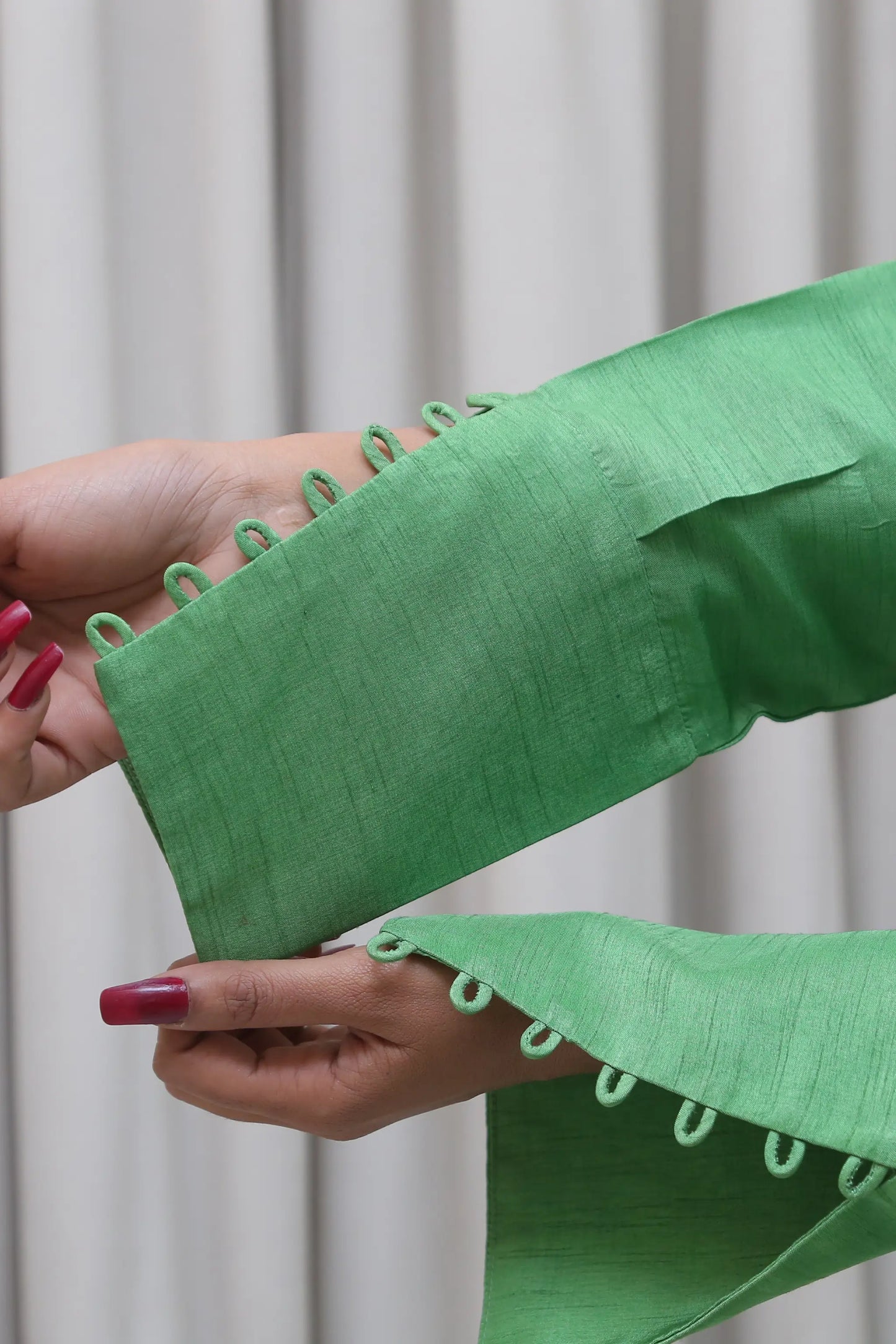 Formal green silk kurta with white straight trousers