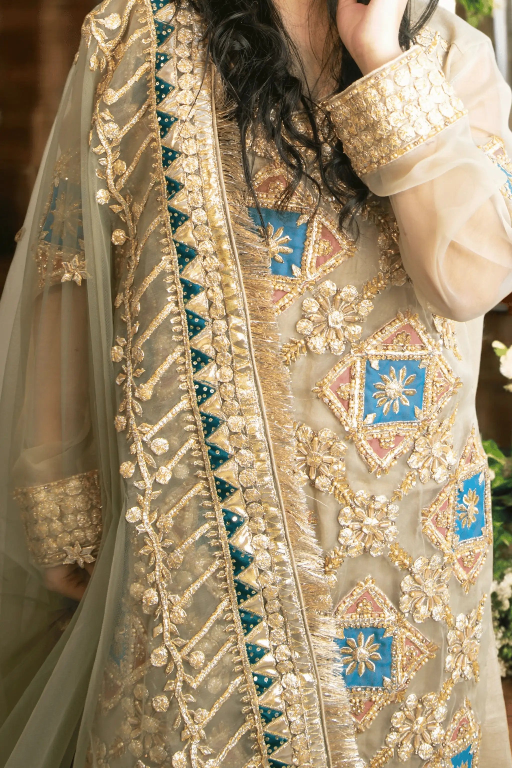 Hand-embroidered shirt with gotta and sequin motifs