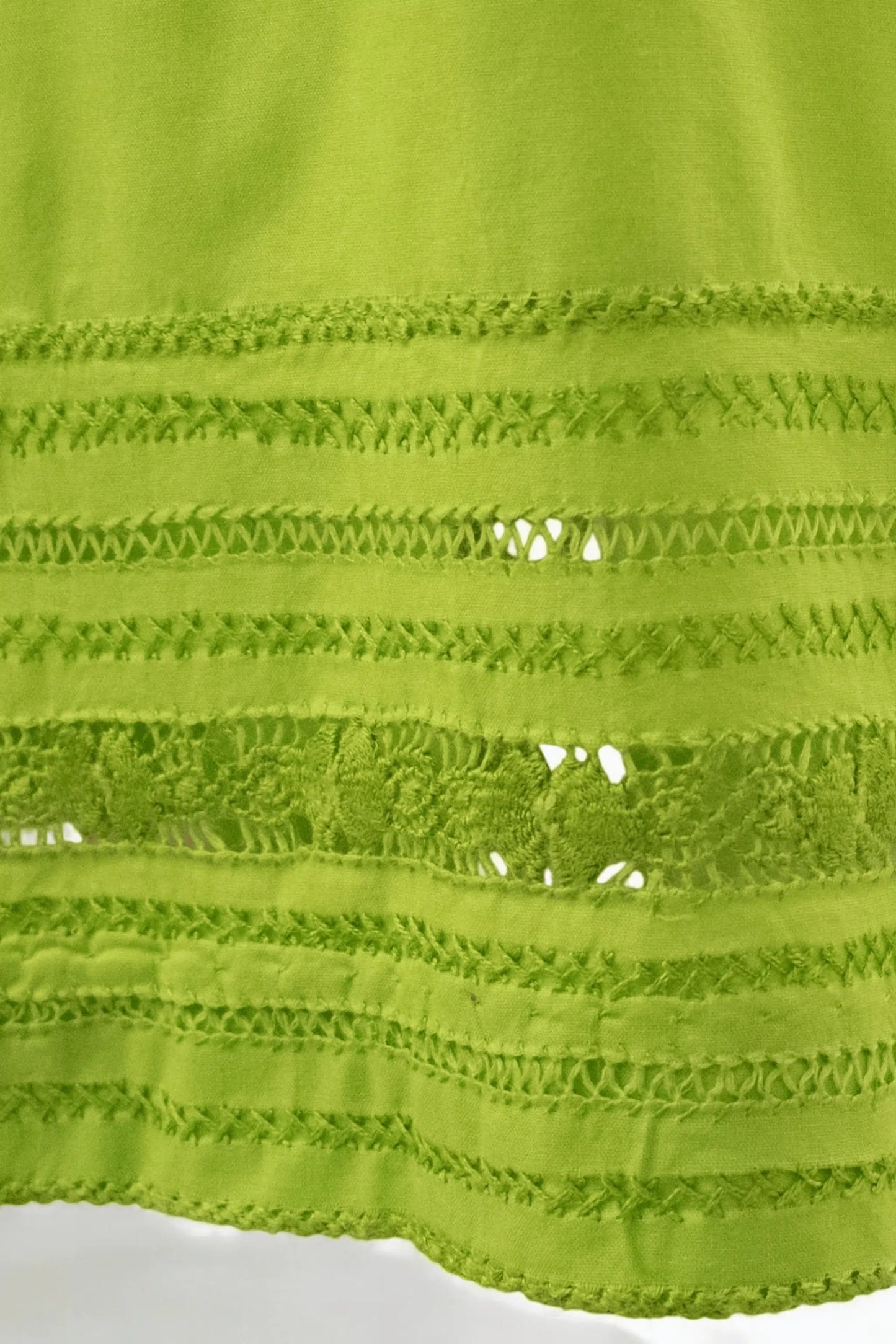 Handcrafted detailing on arms with mirror and thread work