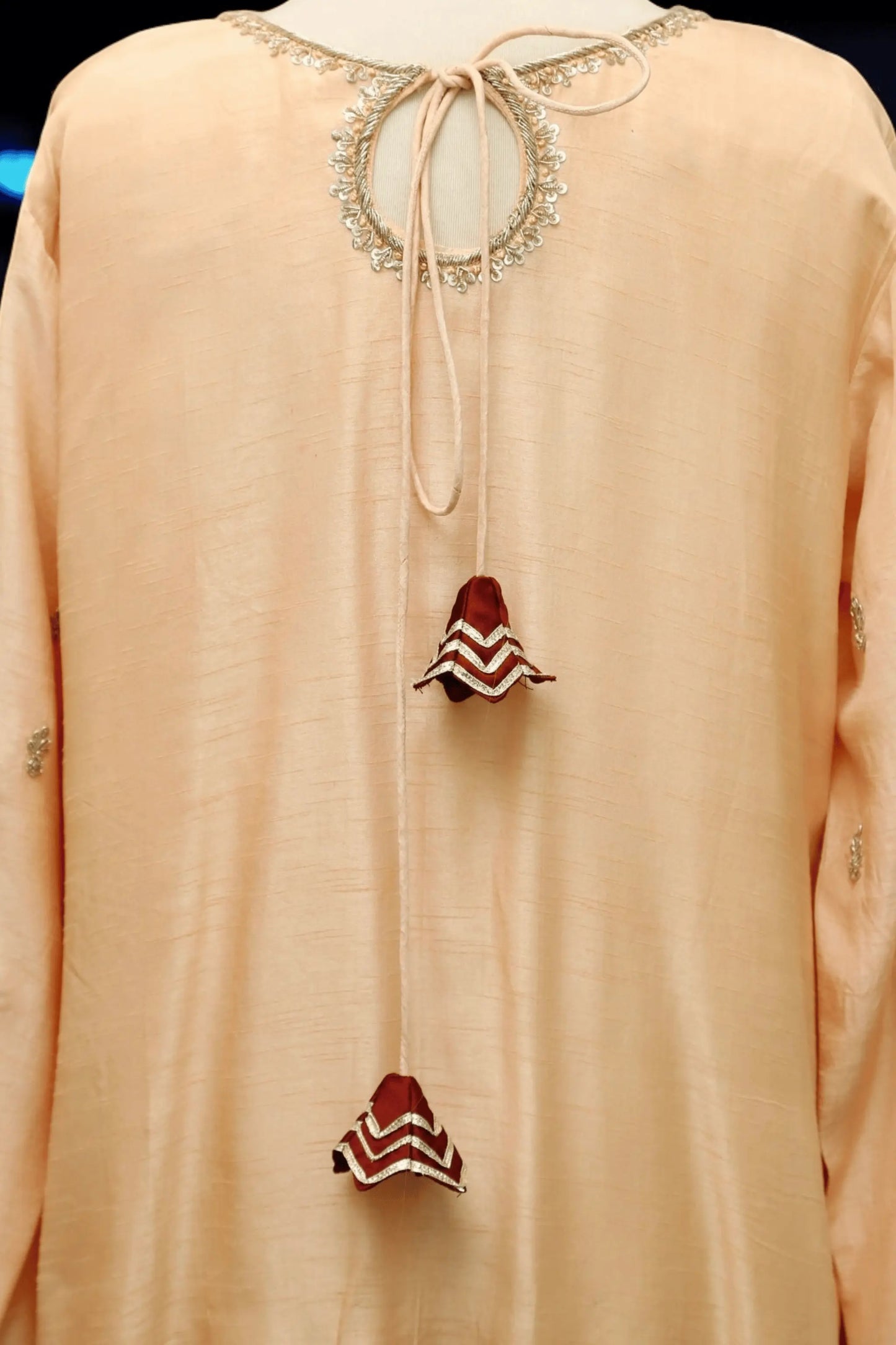 Handcrafted embroidery with pearls, sequins, and thread work