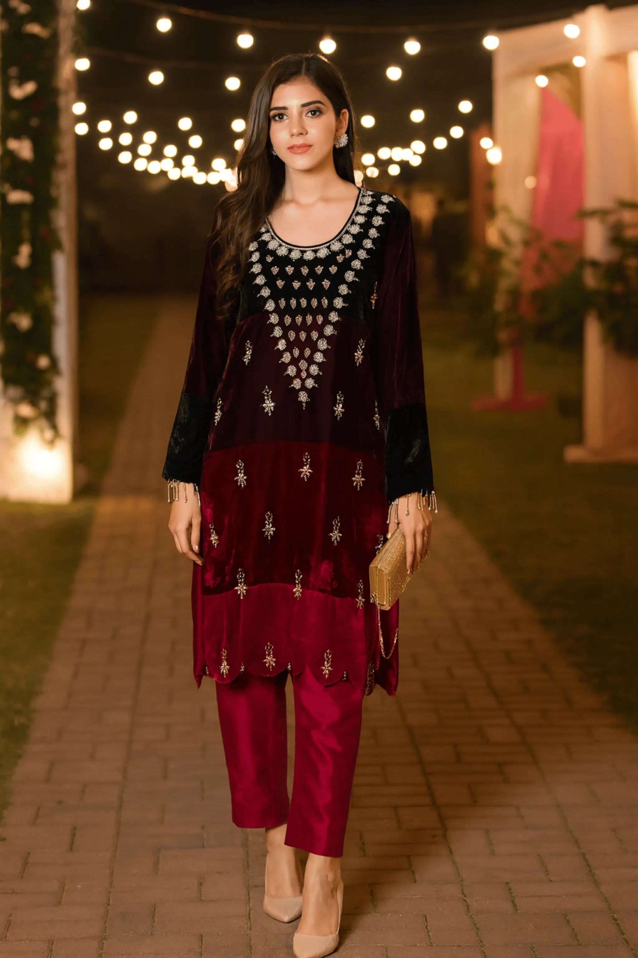 Model wearing Royal Maroon Velvet embroidered 3-piece suit with organza dupatta.