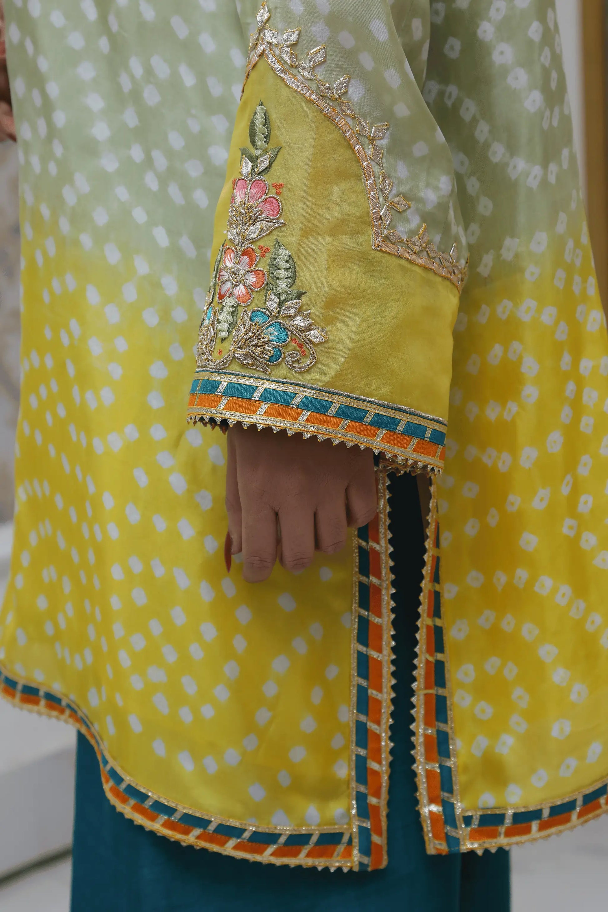 Raw silk farshe shalwar with embroidered hem.
