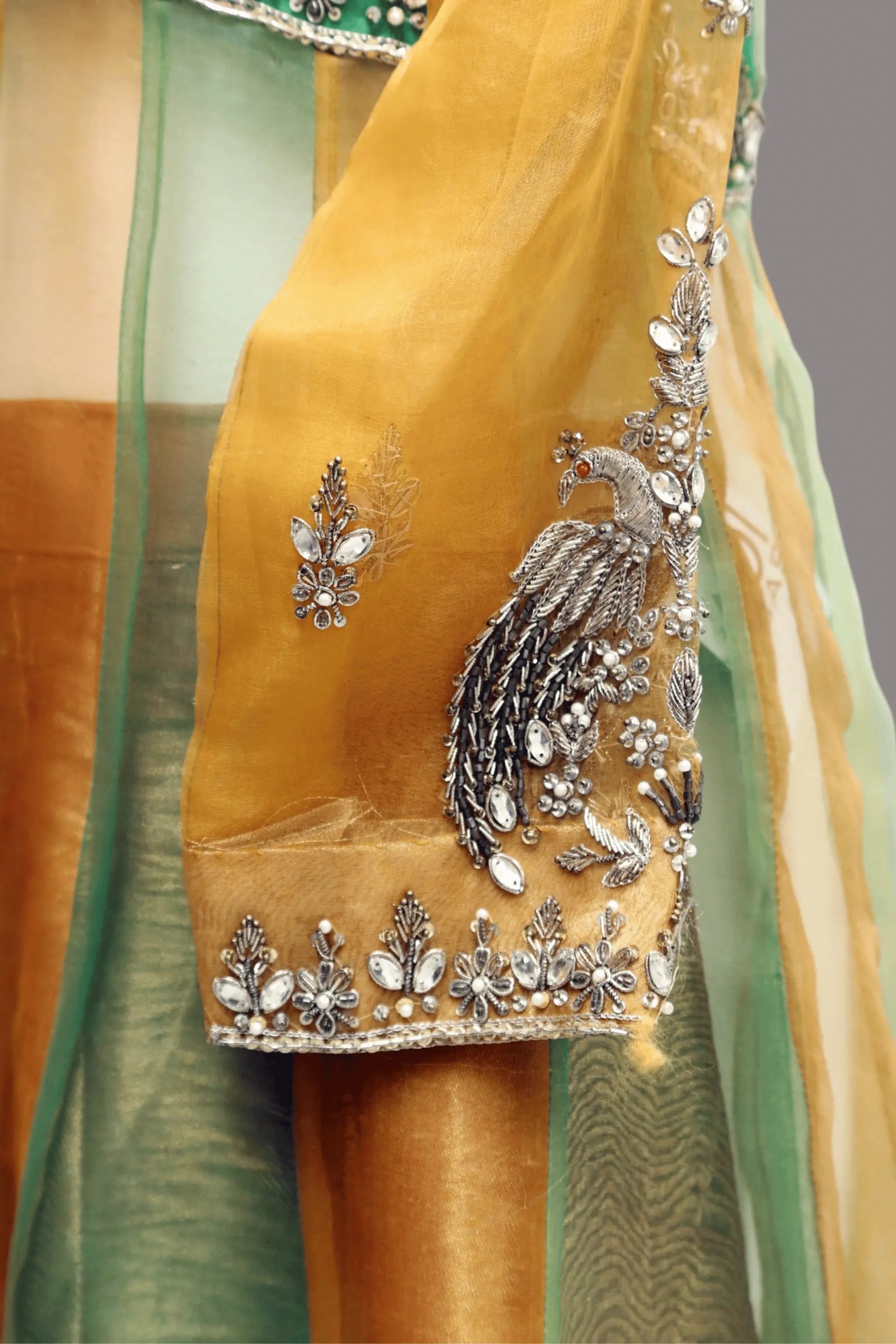 Side View Shamrock three-piece green and gold organza wedding dress with embellished beads and stars work, featuring straight kurta, lehnga, and dupatta — festive bridal wear.